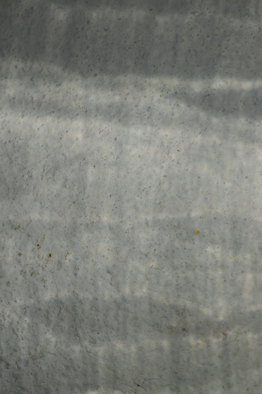 Abstract gray background with horizontal lines.